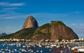 Quarto e sala na Praia Botafogo Smart TV e cozinha completa